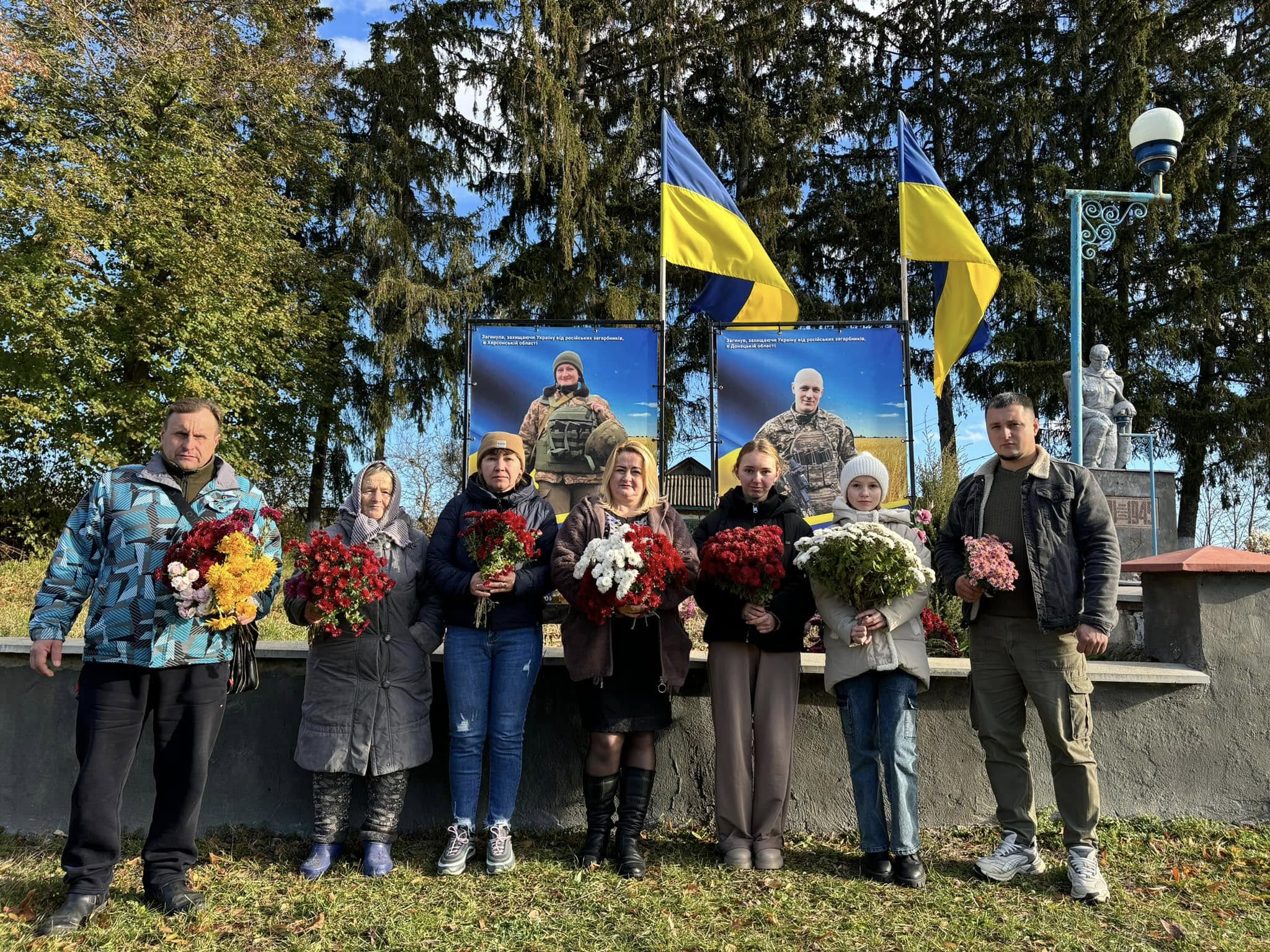 герої